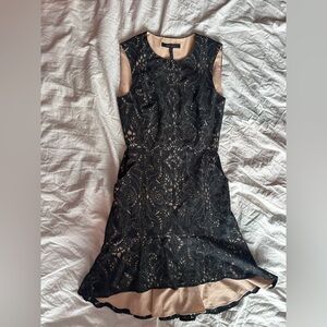 BCBG MaxAzria Elegant Lace Pattern Sleeveless Dress Front Zipper Pockets Black 0